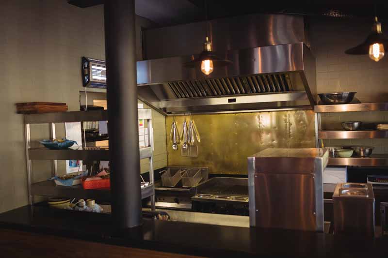Local Ohio restaurant commercial kitchen cleaners near me showing clean commercial kitchen after lights have been turned off.